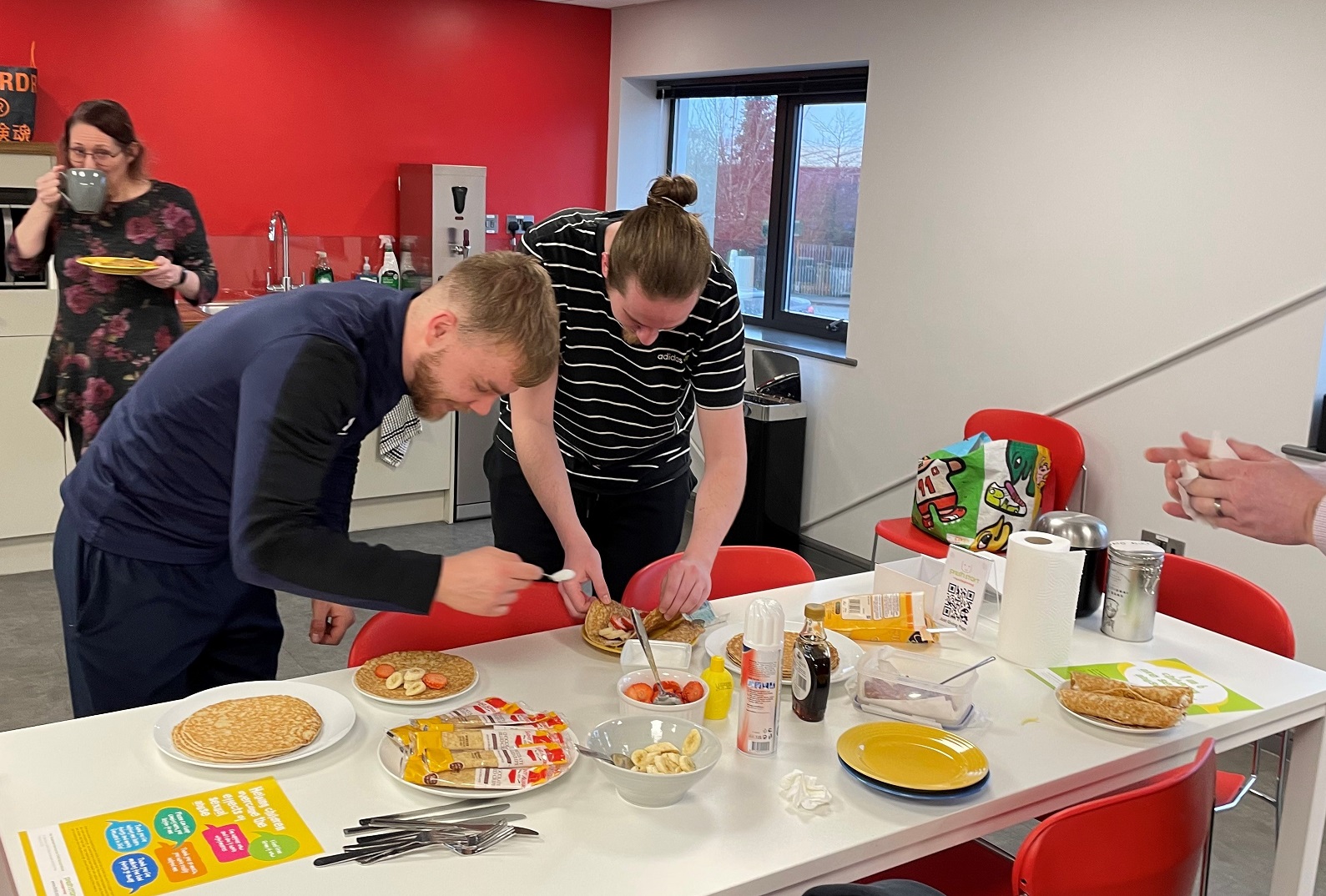 Two Employees Preparing Pancakes - Charity - Antistat