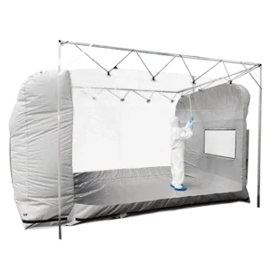 Portable cleanroom tent - shot of fully gowned cleanroom operative cleaning the inside of the tent - shot from outside the tent